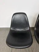 Authentic vintage Herman Miller Eames fibreglass shell chairs with leather cover view 4