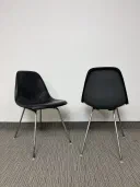 Authentic vintage Herman Miller Eames fibreglass shell chairs with leather cover view 1